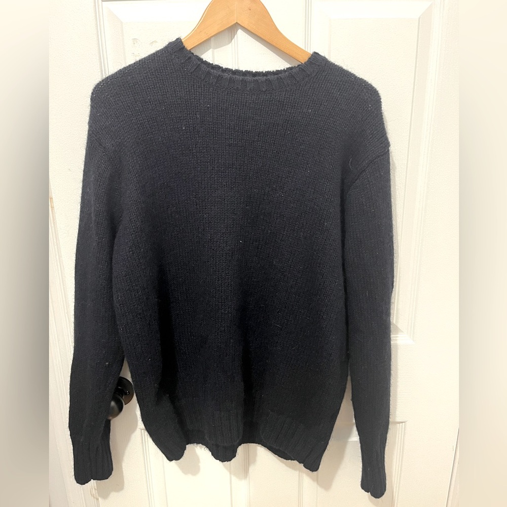 Brandy Melville
Navy Wool Sweater
28” long
23” PTP
90% wool
10% acrylic